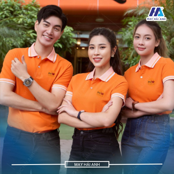 Design of orange uniform polo shirt with durable woven collar for the wearer